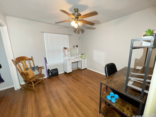 home office featuring wood-type flooring and ceiling fan