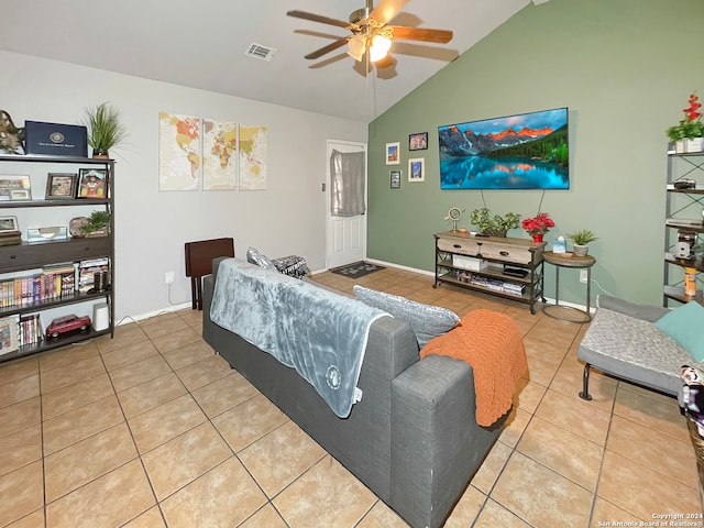 tiled living room with vaulted ceiling and ceiling fan