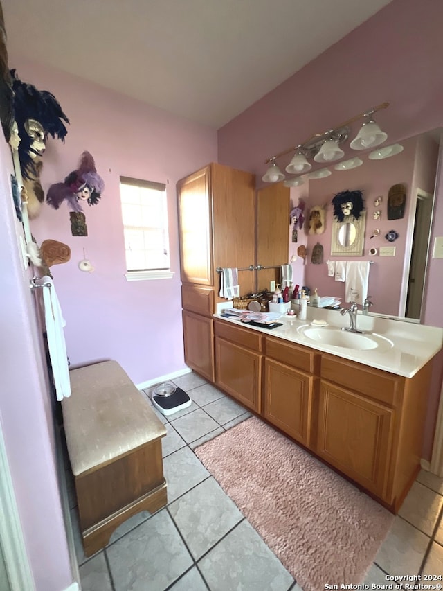 bathroom with tile patterned floors and sink