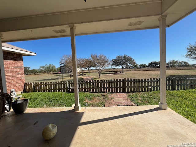 view of patio / terrace with a rural view