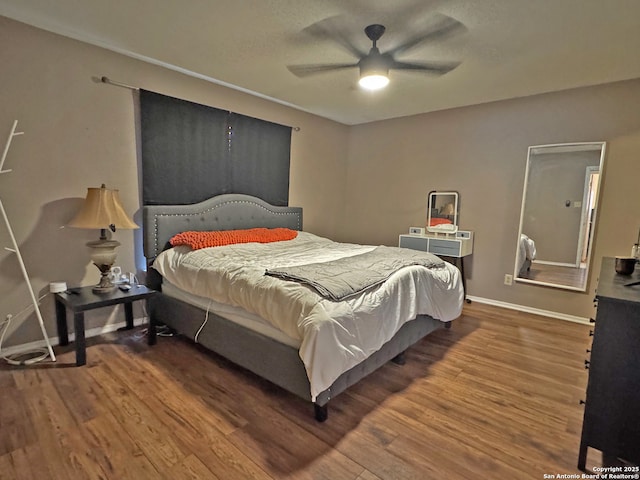 9830 Lauren Mist, San Antonio, TX 78251 - bedroom featuring wood finished floors, baseboards, and a ceiling fan