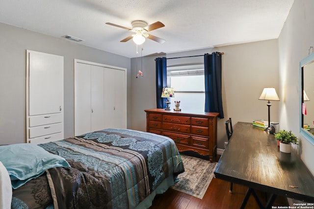 bedroom featuring a closet, ceiling fan, and dark wood-type flooring