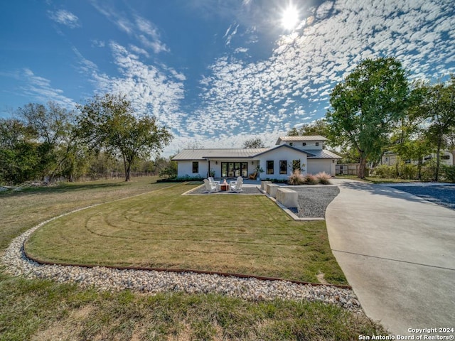 view of front of property with a front lawn