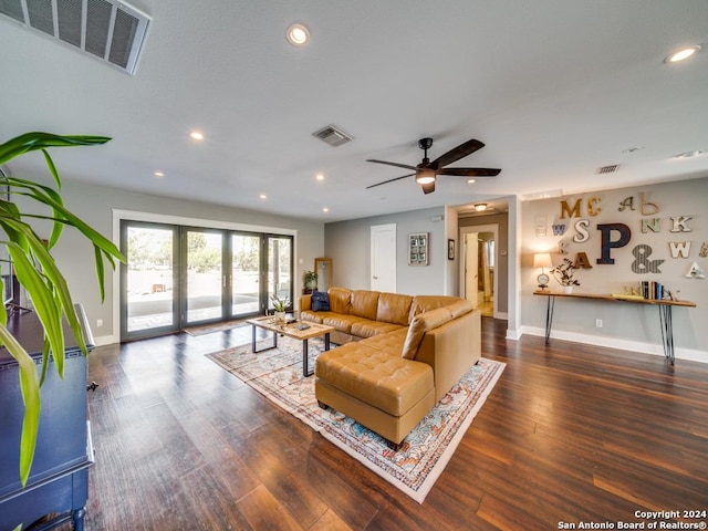 living room featuring french doors, dark hardwood / wood-style flooring, and ceiling fan