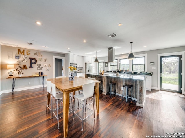 dining room featuring dark hardwood / wood-style floors