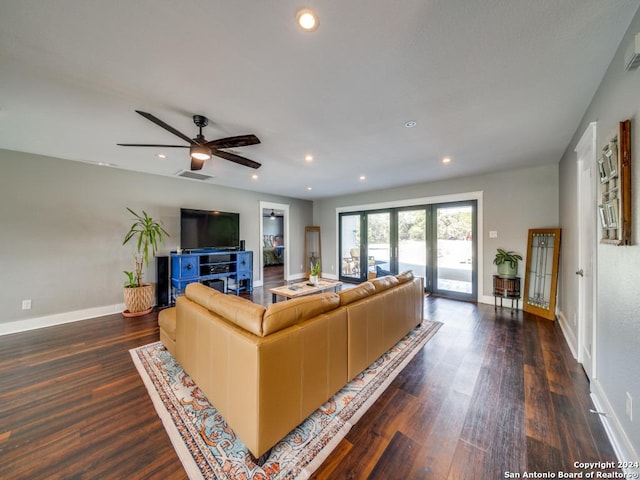 living room featuring french doors, dark hardwood / wood-style floors, and ceiling fan