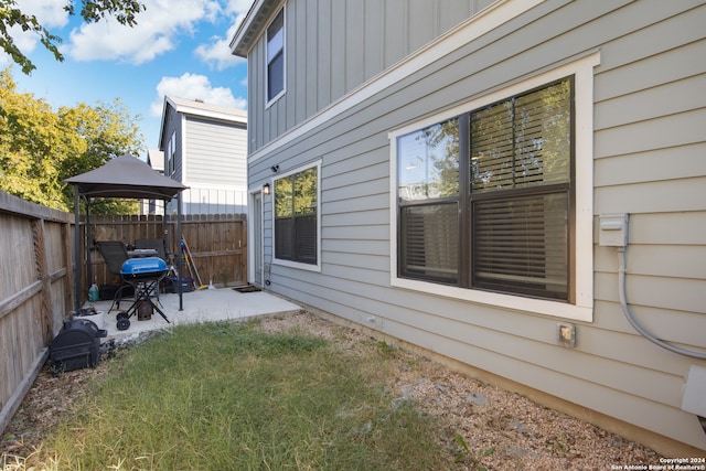 view of yard with a gazebo and a patio