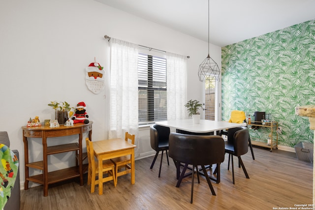 dining area with wood-type flooring