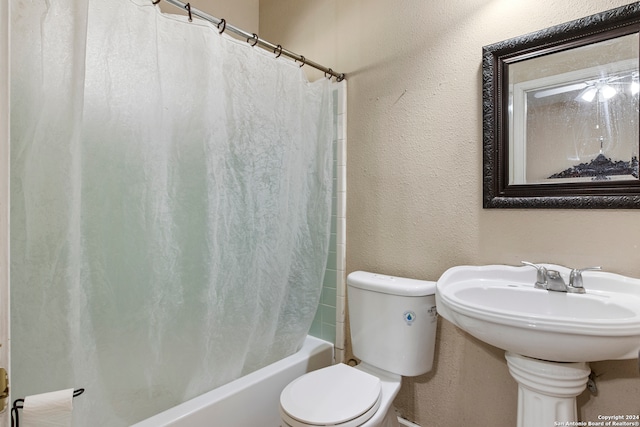 bathroom with toilet and shower / bathtub combination with curtain