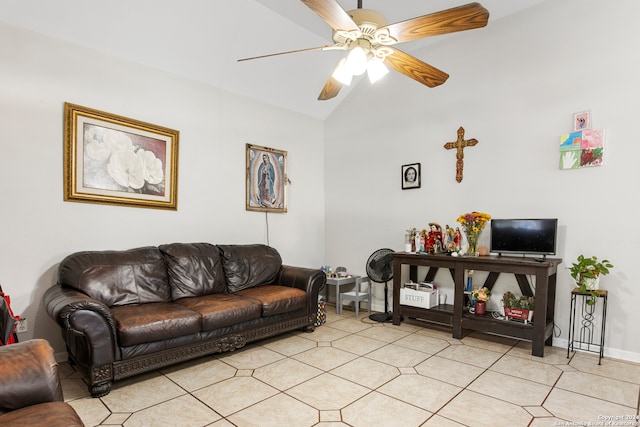 living room featuring ceiling fan, lofted ceiling, and light tile patterned flooring