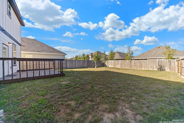 view of yard with a deck