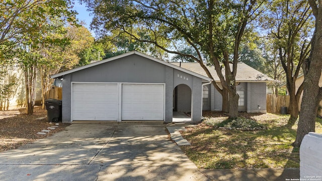 ranch-style home with a garage