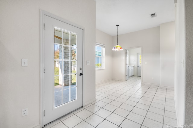 interior space with light tile patterned flooring