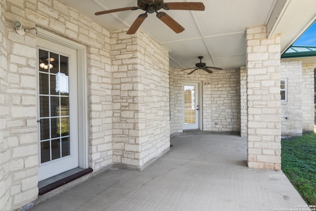 view of exterior entry featuring ceiling fan