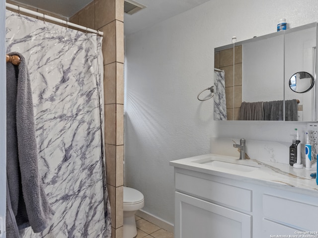 bathroom with tile patterned flooring, vanity, toilet, and a shower with shower curtain