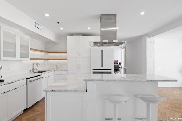 kitchen featuring white appliances, glass insert cabinets, island exhaust hood, white cabinetry, and open shelves