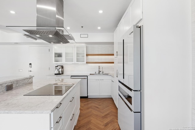 kitchen featuring island range hood, a sink, white cabinetry, dishwasher, and glass insert cabinets