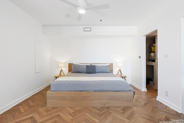 bedroom featuring baseboards