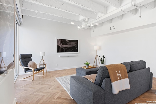 living area featuring baseboards