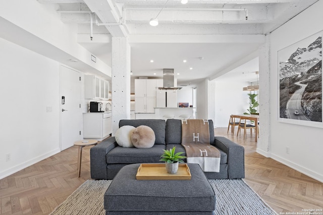 living area with recessed lighting and baseboards