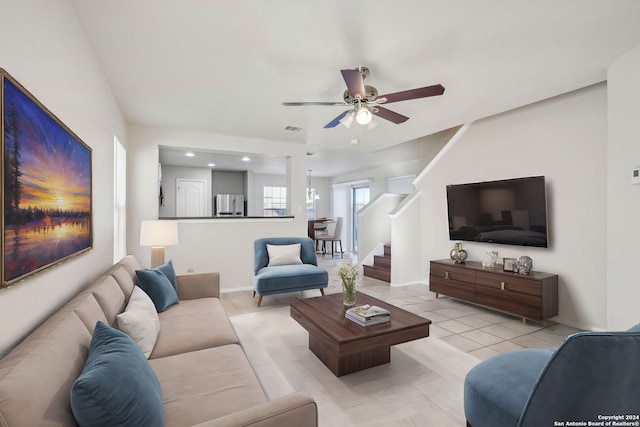 tiled living room featuring ceiling fan