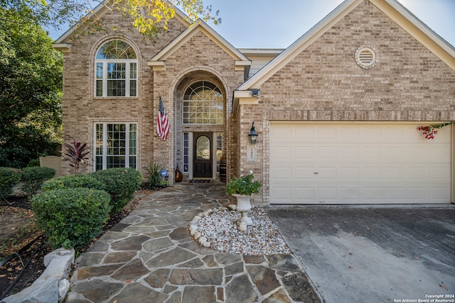 front of property with a garage