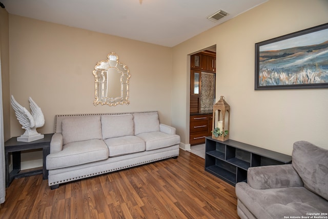 living room with dark hardwood / wood-style floors