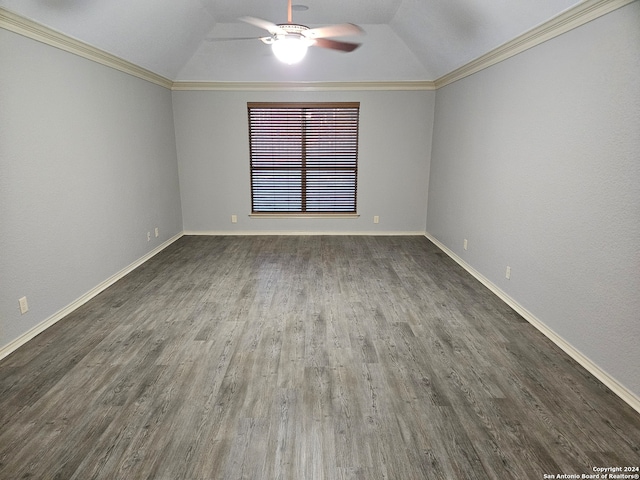 spare room with ceiling fan, lofted ceiling, crown molding, and dark wood-type flooring