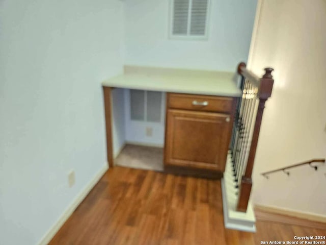 interior space with dark hardwood / wood-style flooring