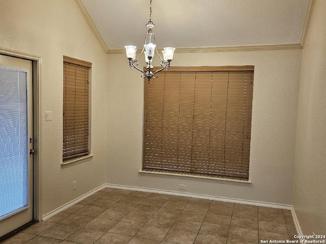 tiled spare room with crown molding, lofted ceiling, and a notable chandelier