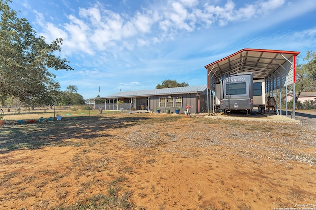 exterior space featuring a carport