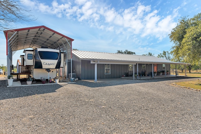 view of front of house featuring a carport