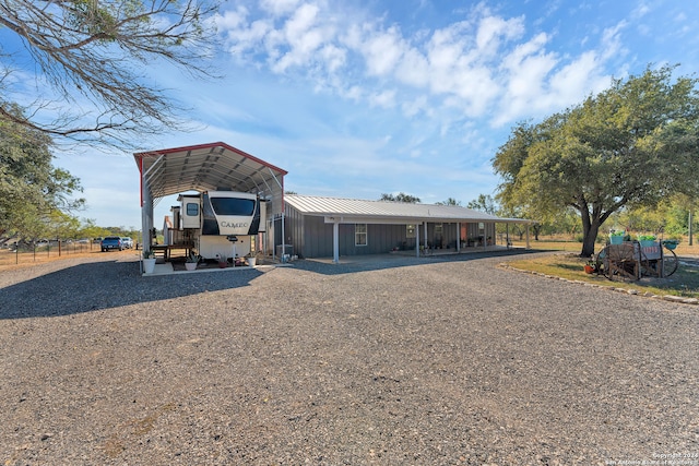 view of front of property with a carport