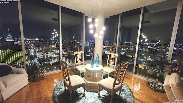 dining room with hardwood / wood-style floors