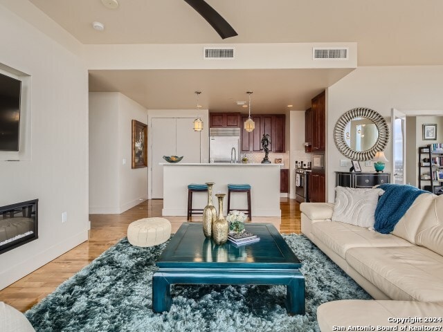 living room featuring light wood-type flooring