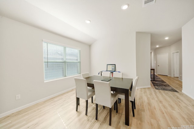 dining space with light wood-type flooring