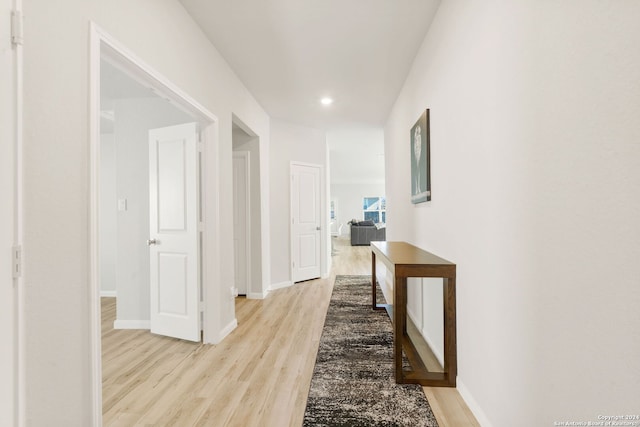 corridor featuring light wood-type flooring