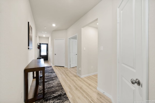 hallway featuring light hardwood / wood-style flooring