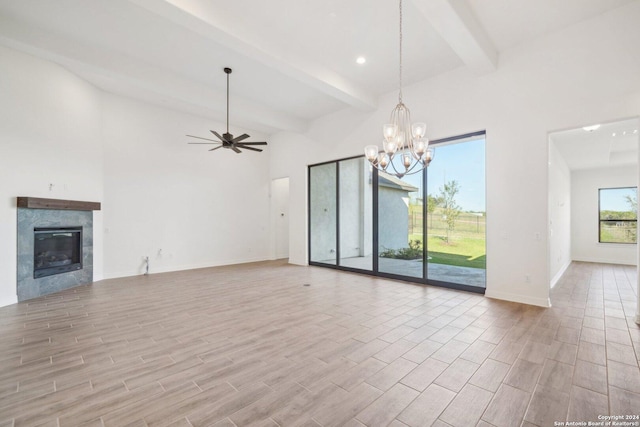 23422 Grande Vis, San Antonio, TX 78261 - unfurnished living room featuring light wood-style floors, a tiled fireplace, ceiling fan, baseboards, and a chandelier