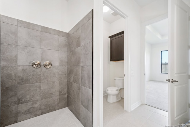 bathroom featuring tile patterned floors and toilet