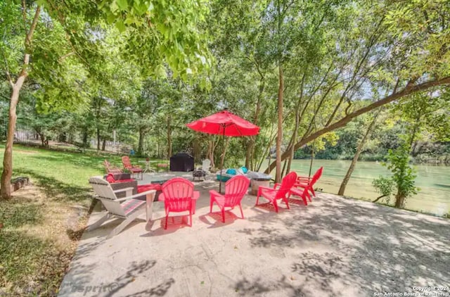 view of patio featuring a fire pit