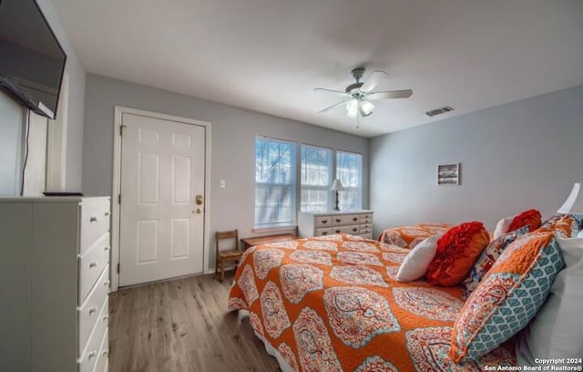 bedroom featuring ceiling fan and light wood-type flooring