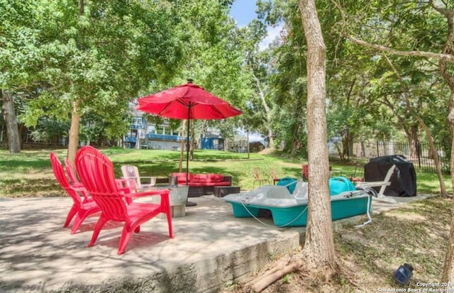 view of patio / terrace featuring a grill and an outdoor hangout area