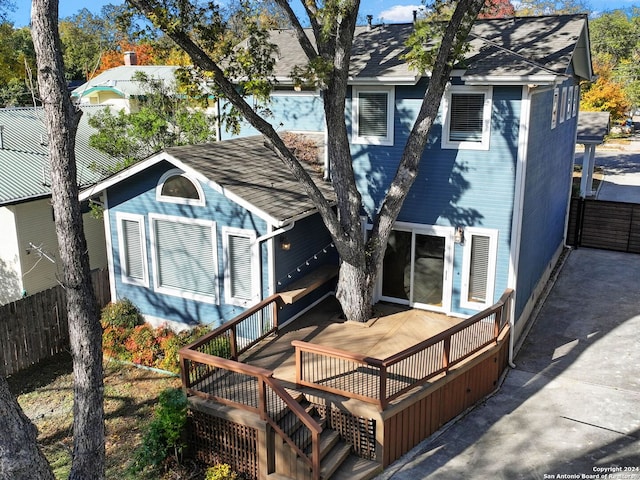 132 Argo Ave, Alamo Heights, TX 78209 - back of house with a shingled roof and a wooden deck