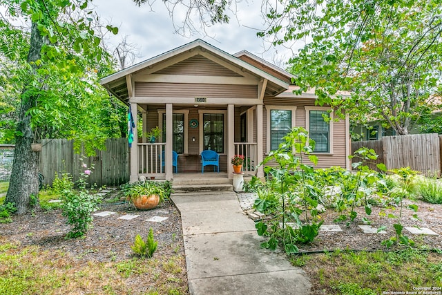 entrance to property featuring a porch