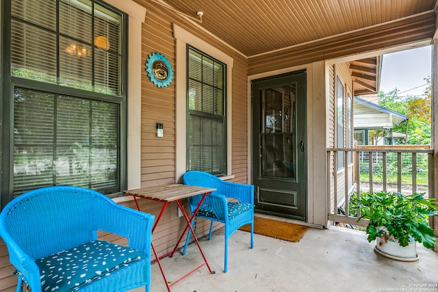 doorway to property with a porch