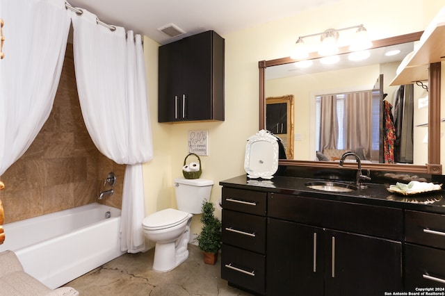 full bathroom featuring tile patterned flooring, shower / tub combo, vanity, and toilet