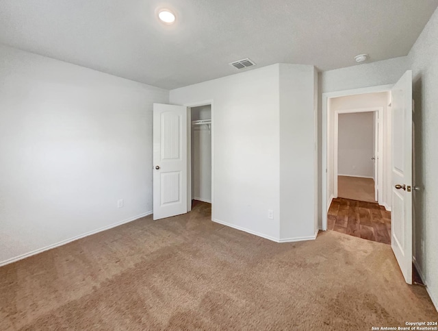 7502 Hercules Pt, San Antonio, TX 78252 - unfurnished bedroom with carpet floors, baseboards, and a closet