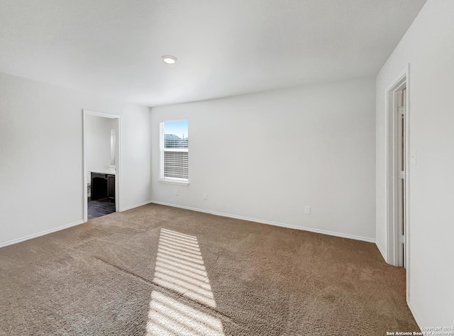 7502 Hercules Pt, San Antonio, TX 78252 - unfurnished living room featuring carpet flooring and baseboards