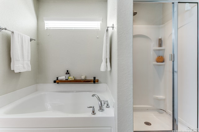 bathroom featuring walk in shower